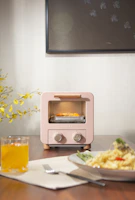 A warm, inviting kitchen corner featuring a compact toaster oven.