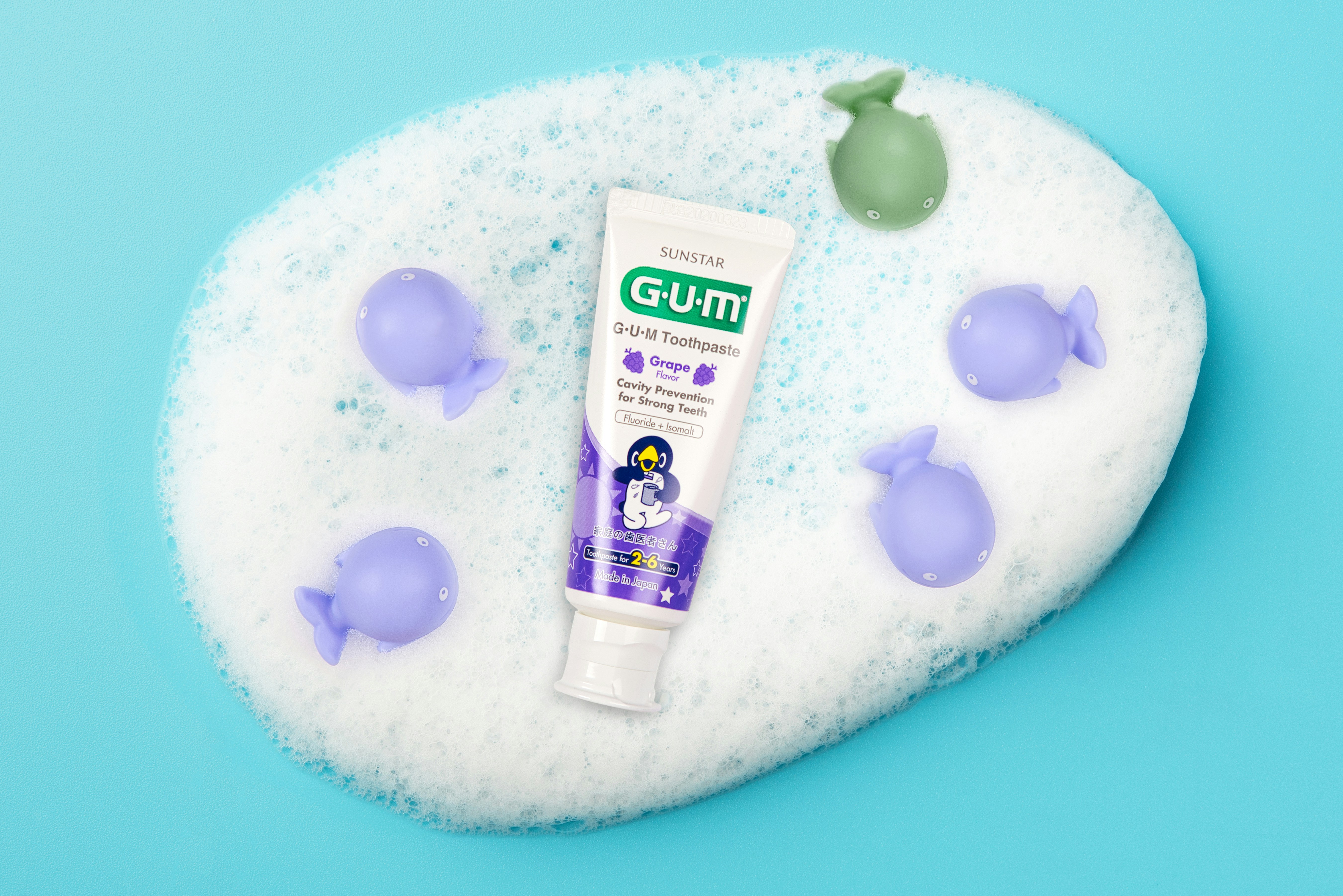 a white object with a blue circle and a white object with a blue circle on it