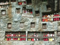 a group of people sitting on a balcony