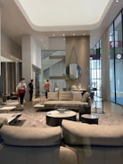 A spacious interior of a high-end living room.