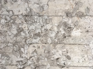 Dust particles from lead paint on a wooden floor surface