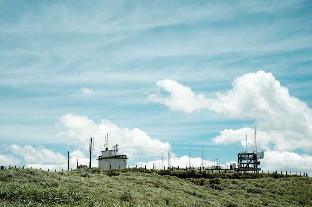 a group of windmills on a hill