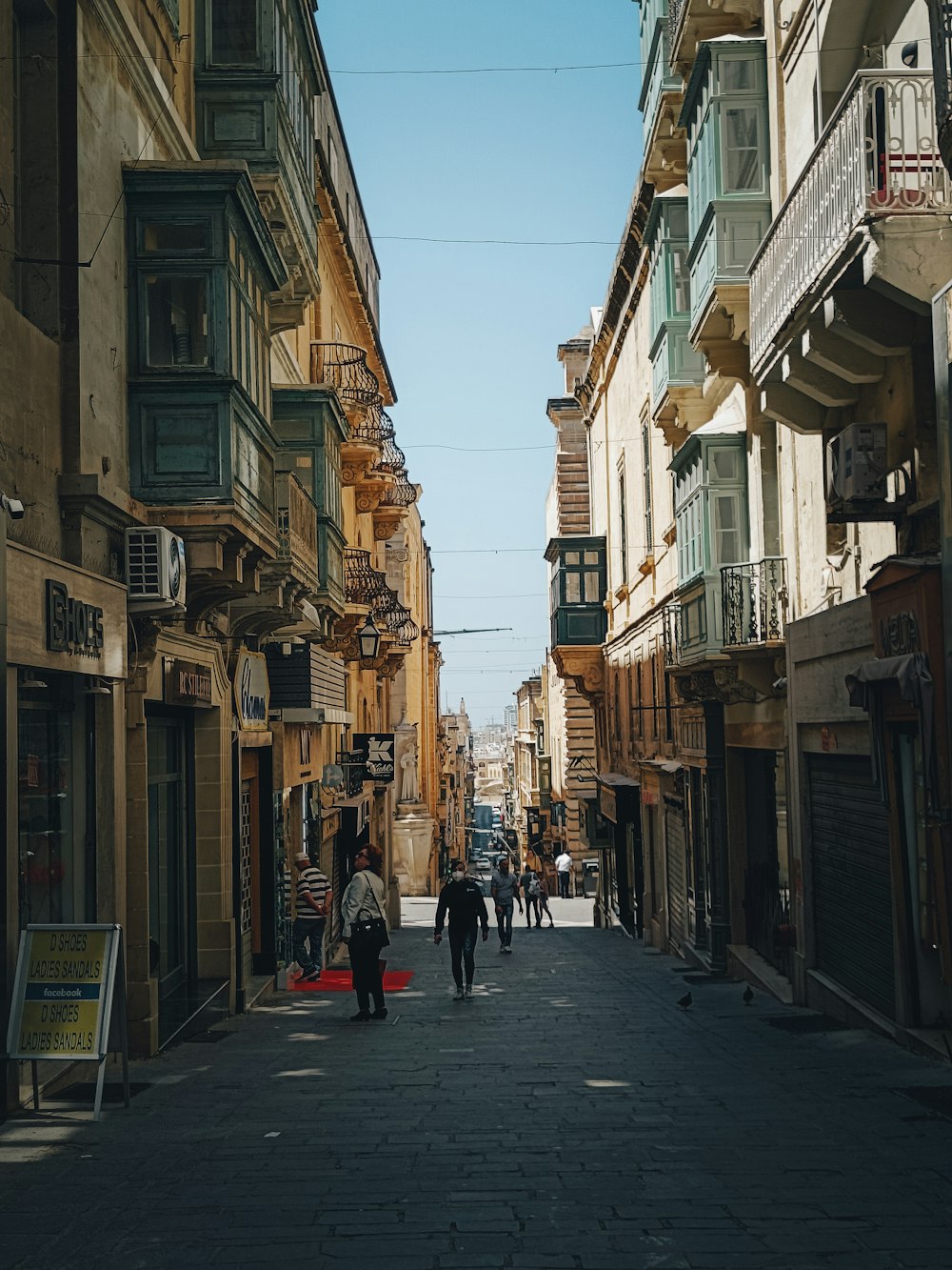 people walking down a street