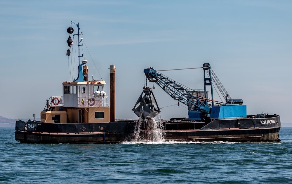 a tugboat pushing a barge