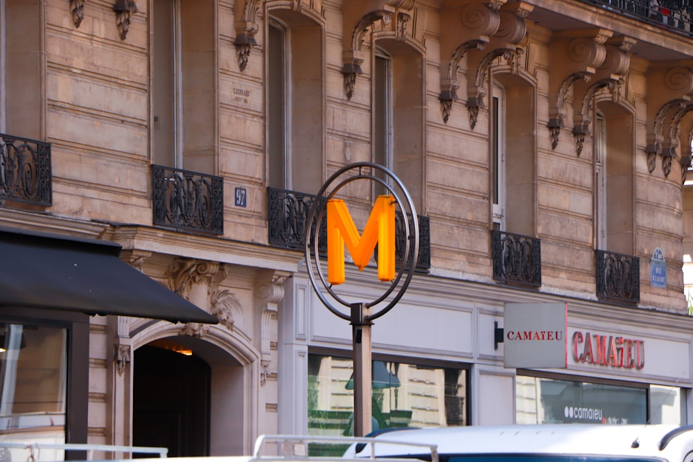 a sign in front of a building