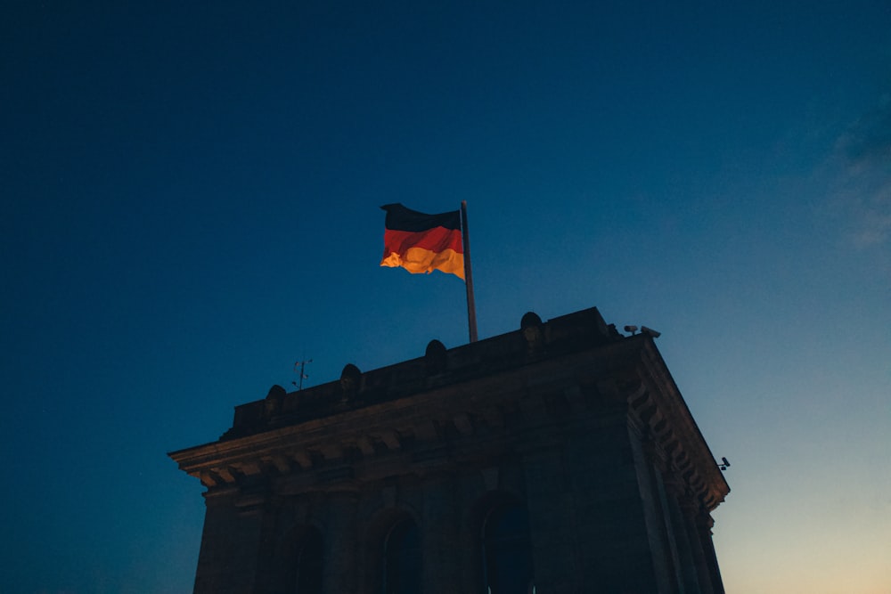 a flag on top of a building