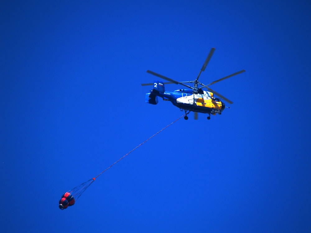 a helicopter and a person in the air