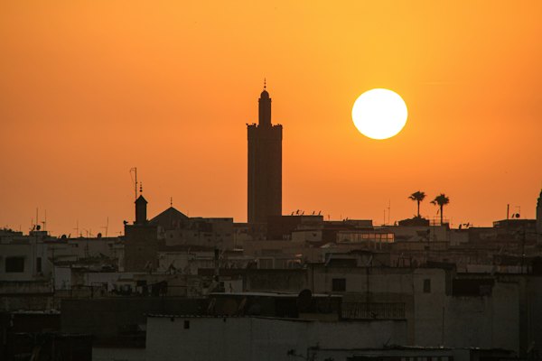A minaret silhouetted at sunset — Rabat, Morocco