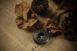 A close-up of an antique pocket watch lying on a lace tablecloth, symbolizing time and memory.
