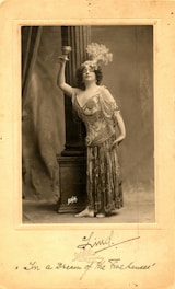a person holding a glass