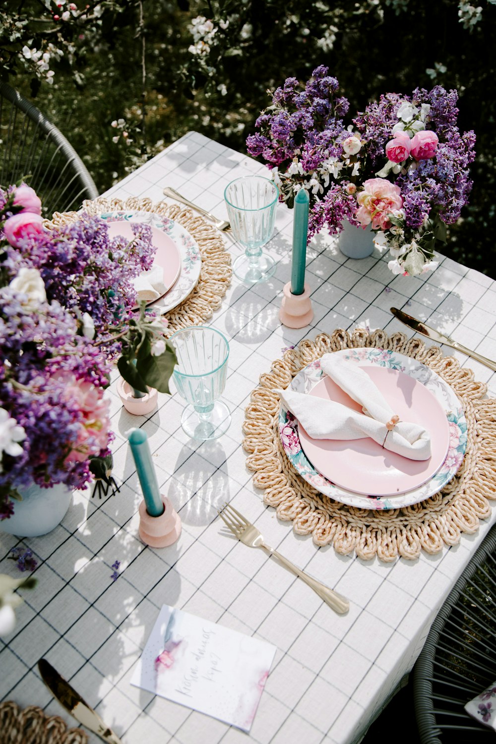 a table with plates and glasses