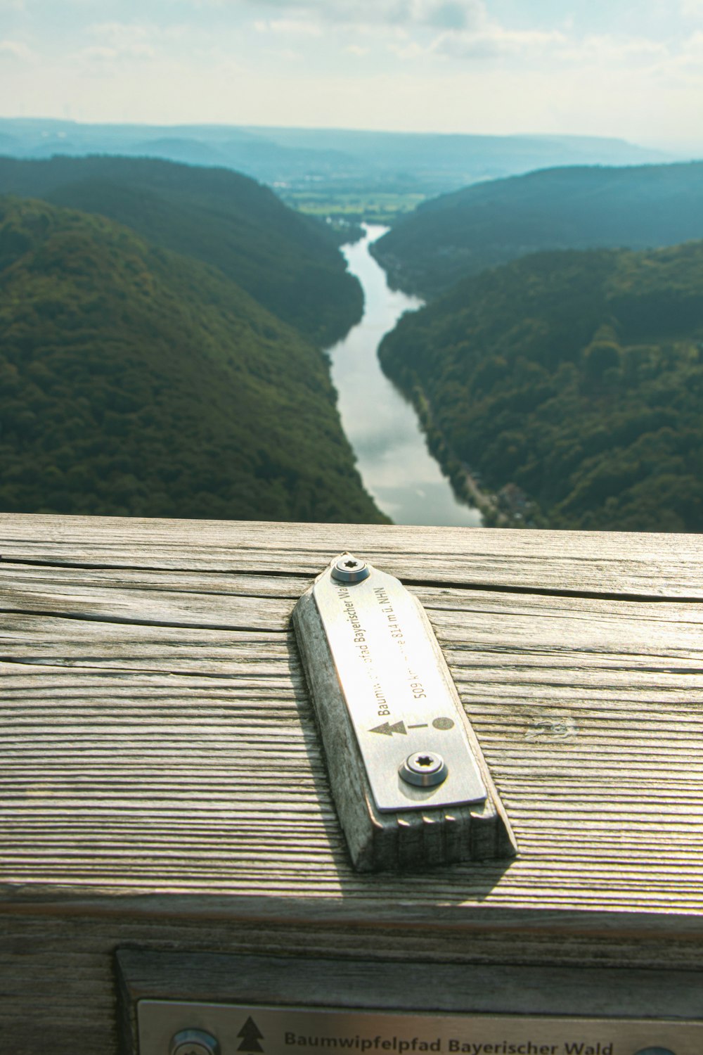 a wooden deck overlooking a river