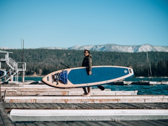 a person holding a surfboard