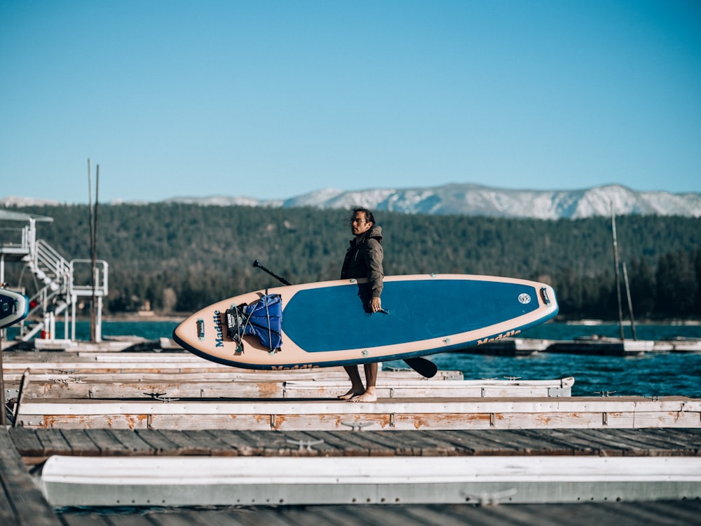 a person holding a surfboard