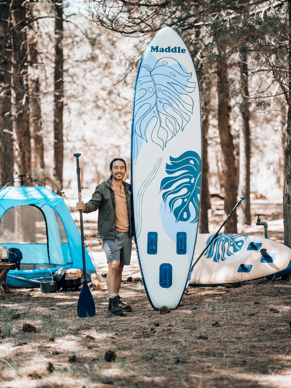 a person holding a surfboard