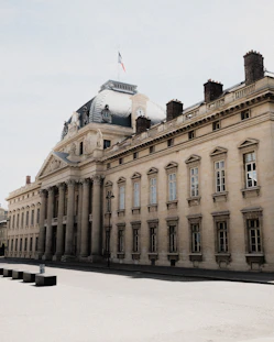a large building with a flag on top
