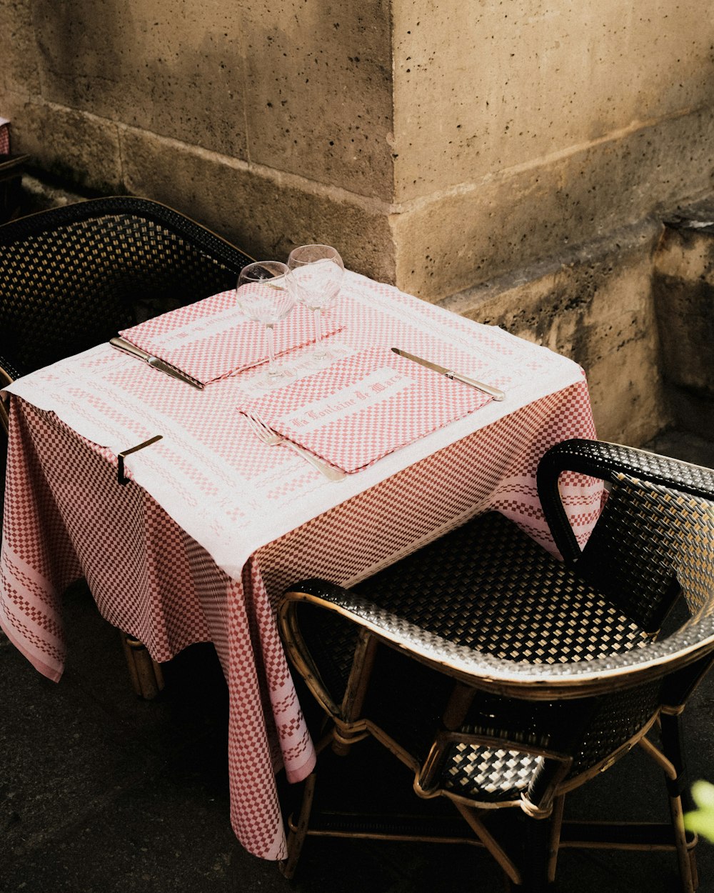 a table with a pink cloth on it