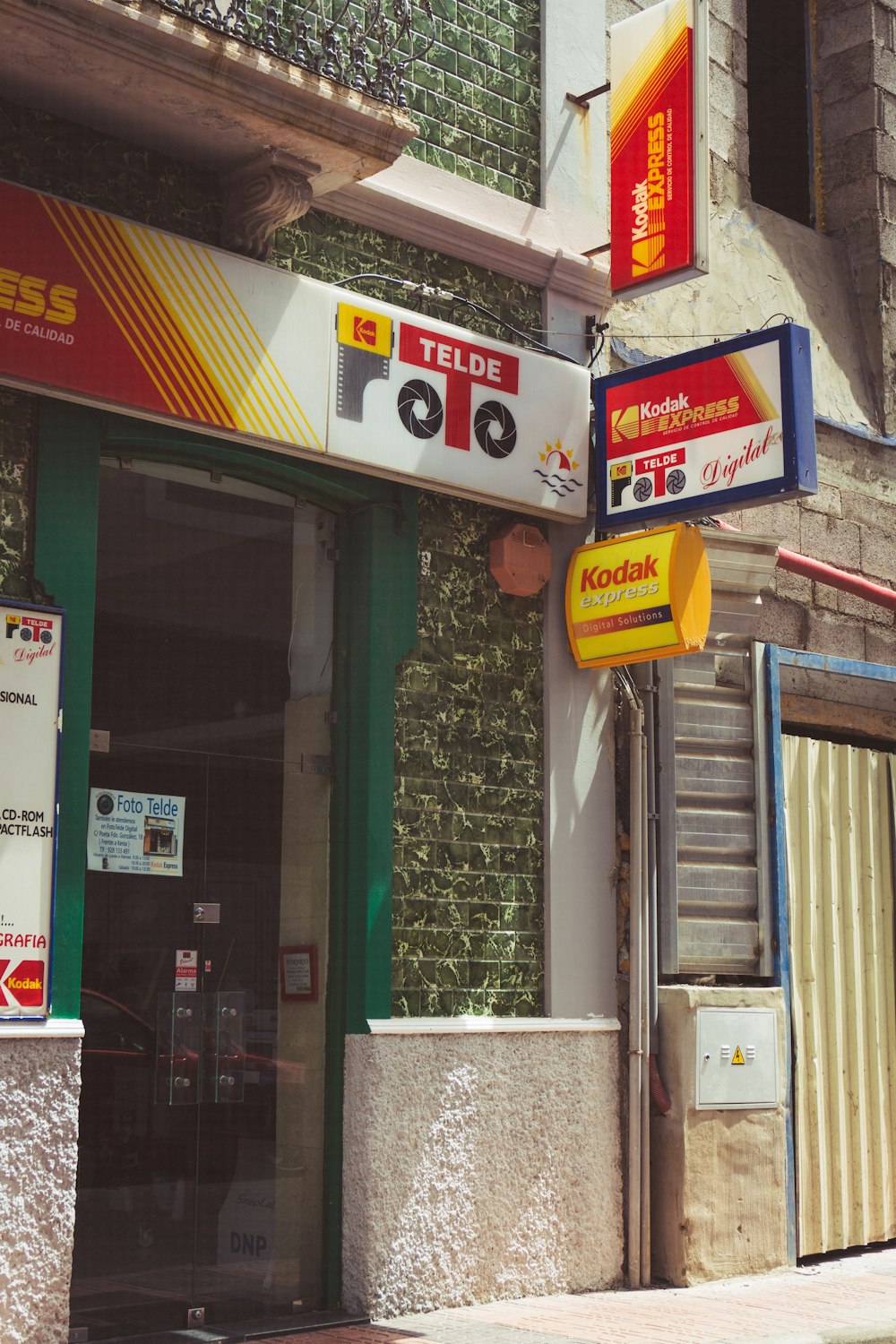 a store front with signs