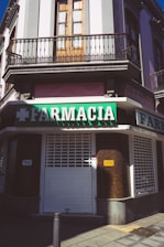 a street sign on the corner of a building