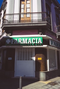 a street sign on the corner of a building
