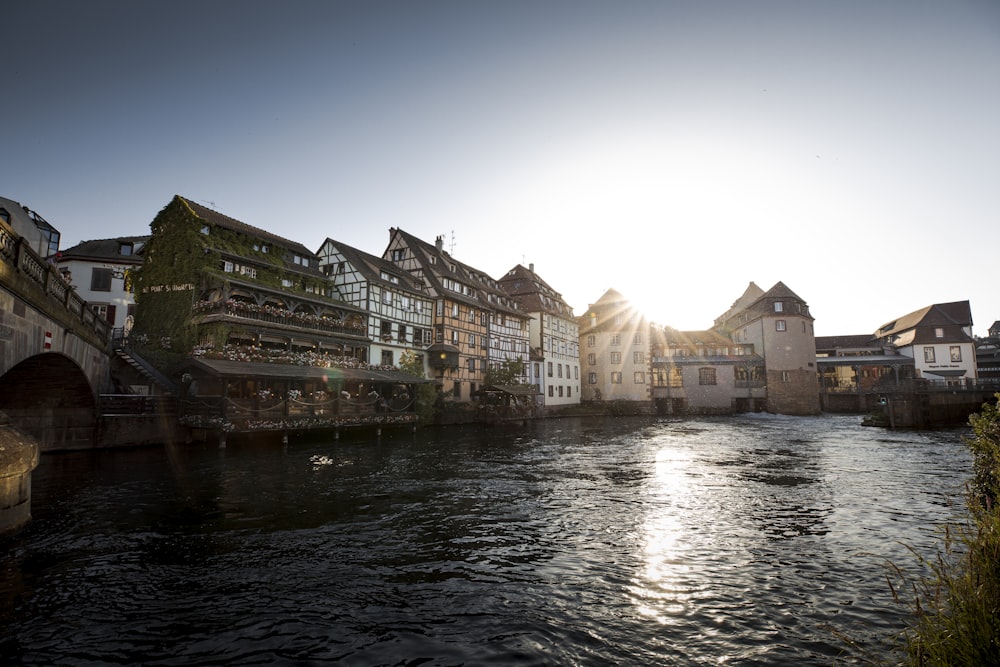 a river with buildings along it