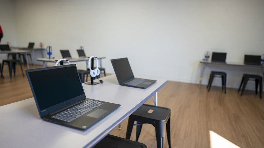 Laptops arranged in a classroom for training