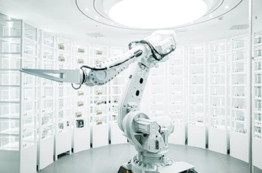 white robotic arm in display showroom