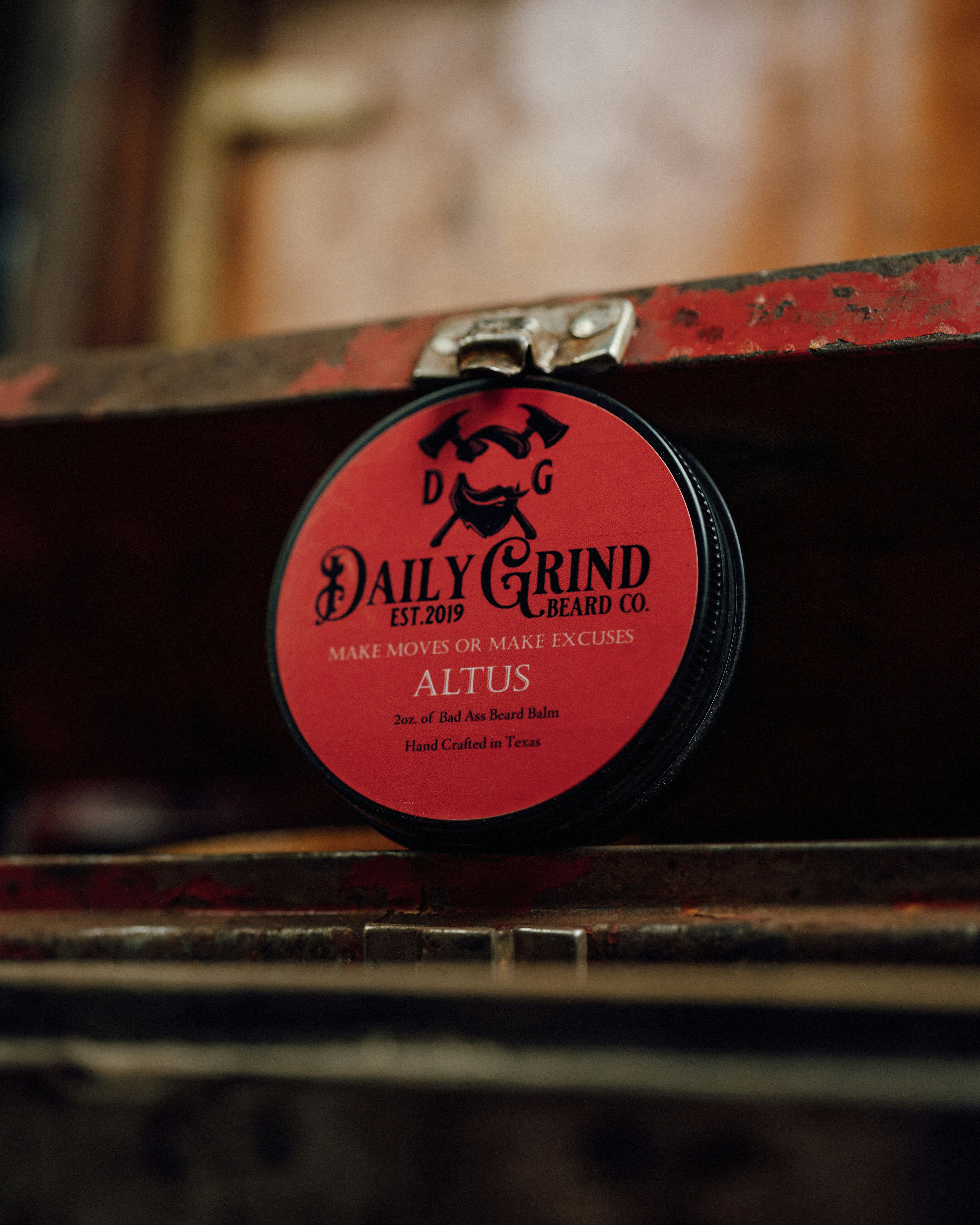 a red and white tag on a metal surface