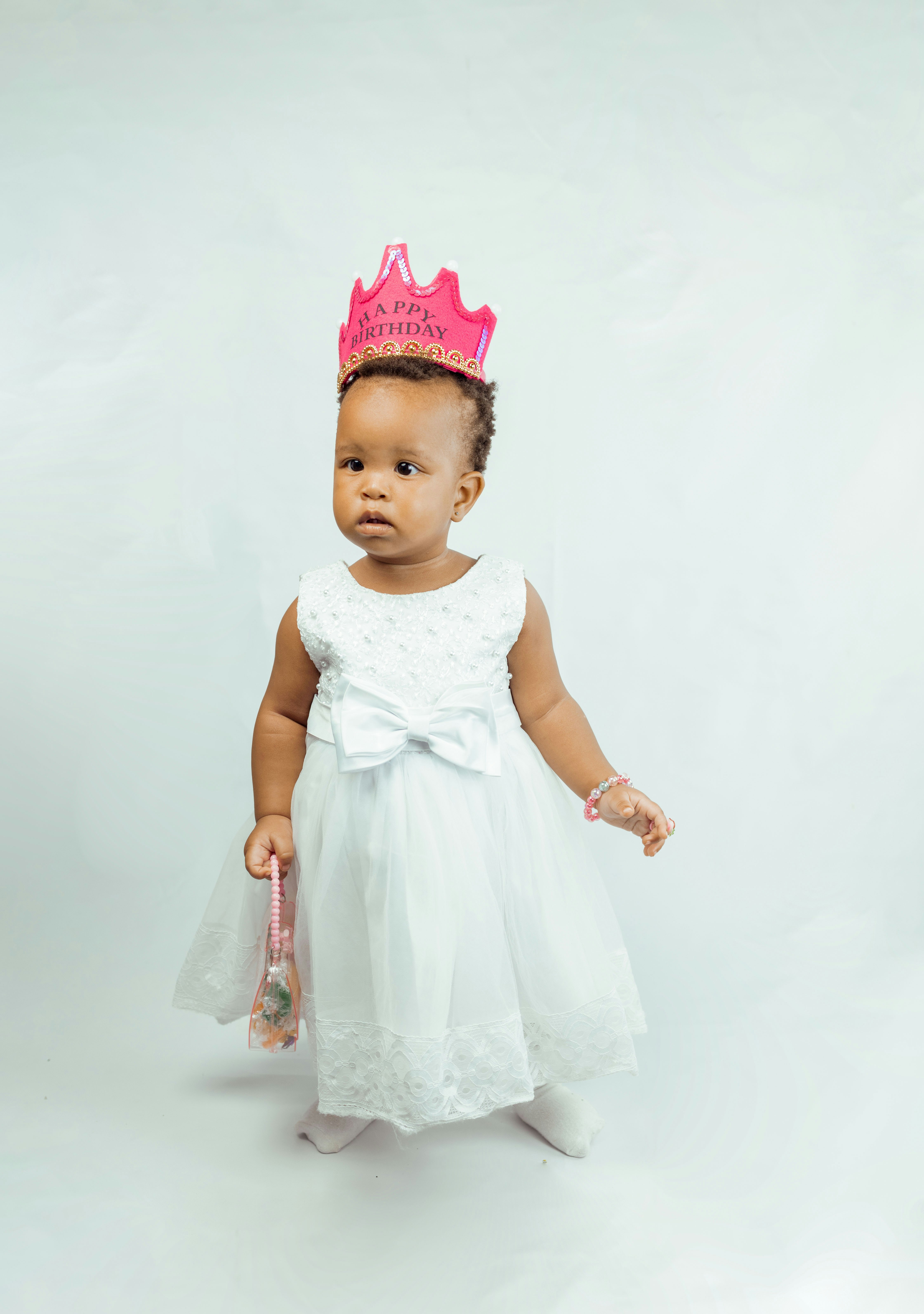 a baby wearing a dress