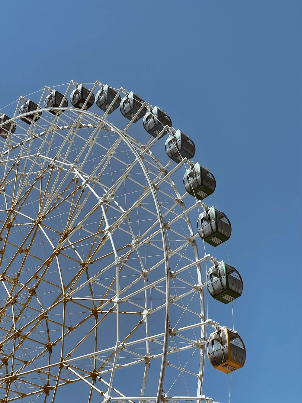 a ferris wheel with blue sky