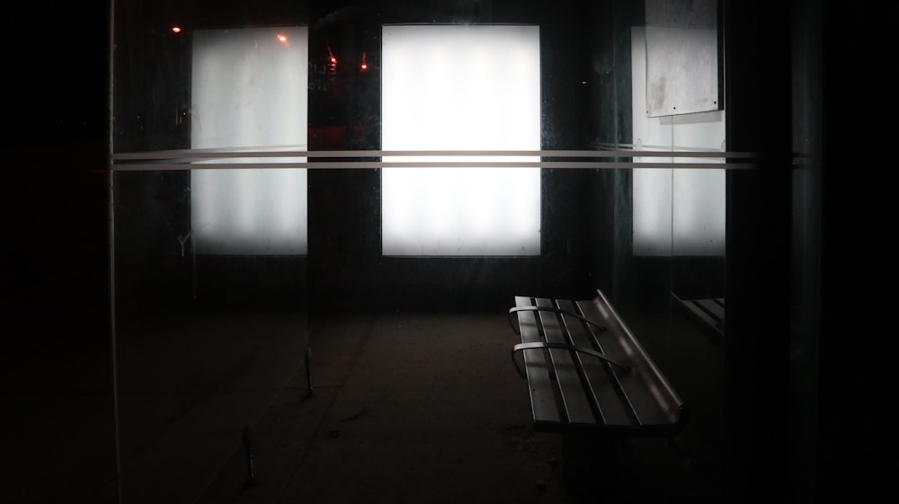 a bench in a dark room