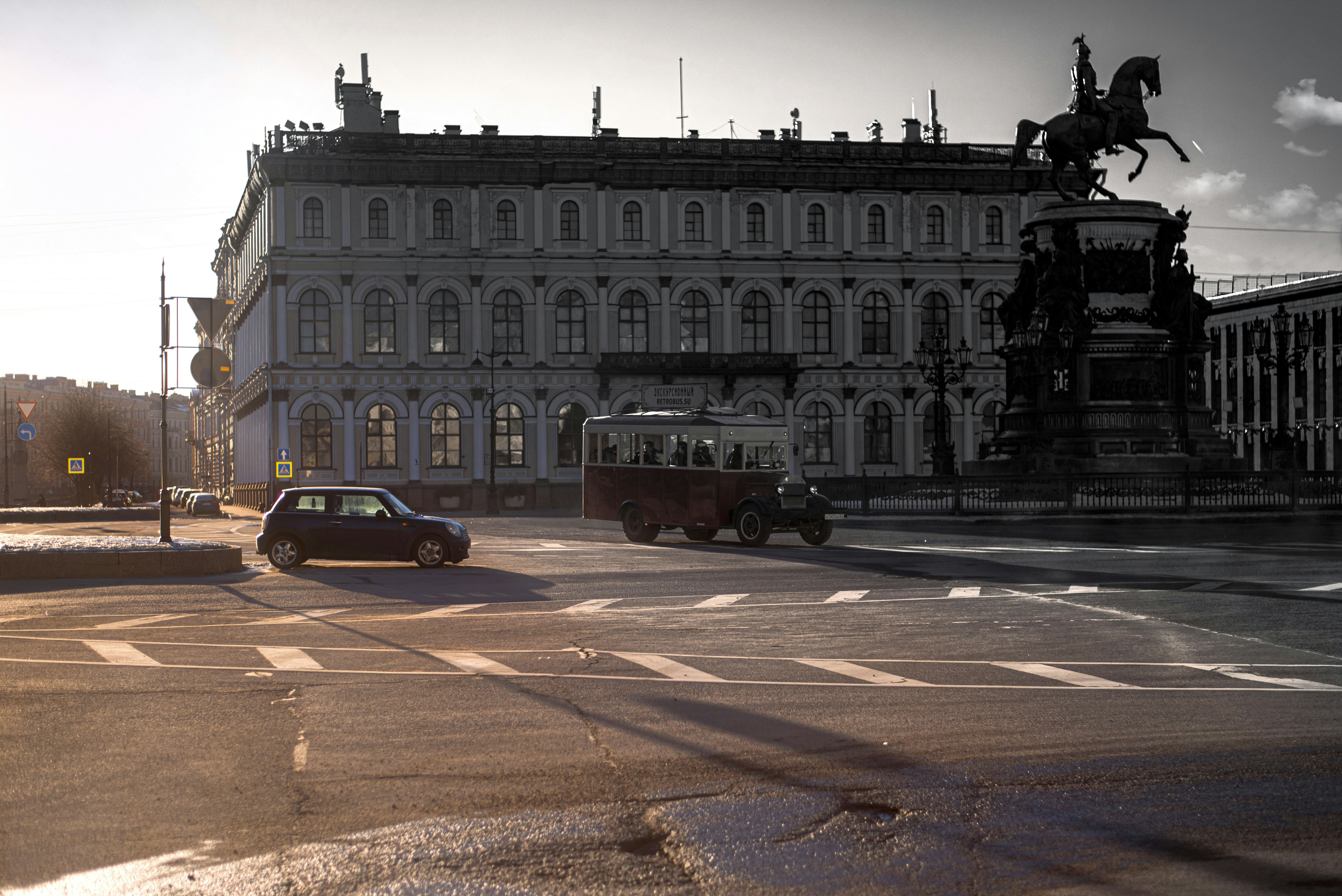 a large building with a statue in front of it