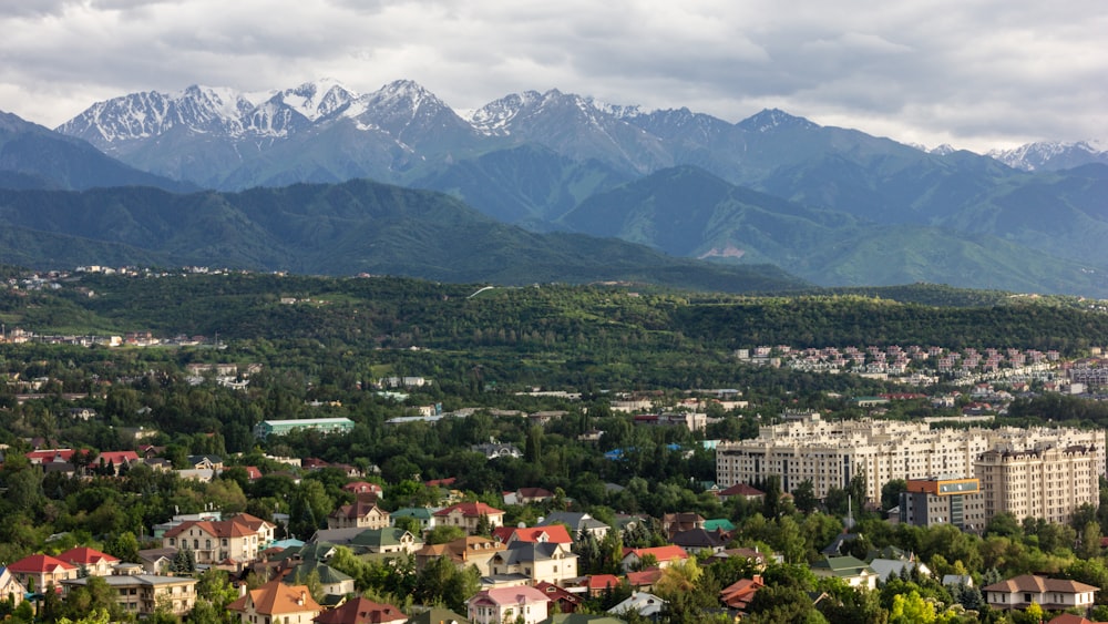 a city with mountains in the background