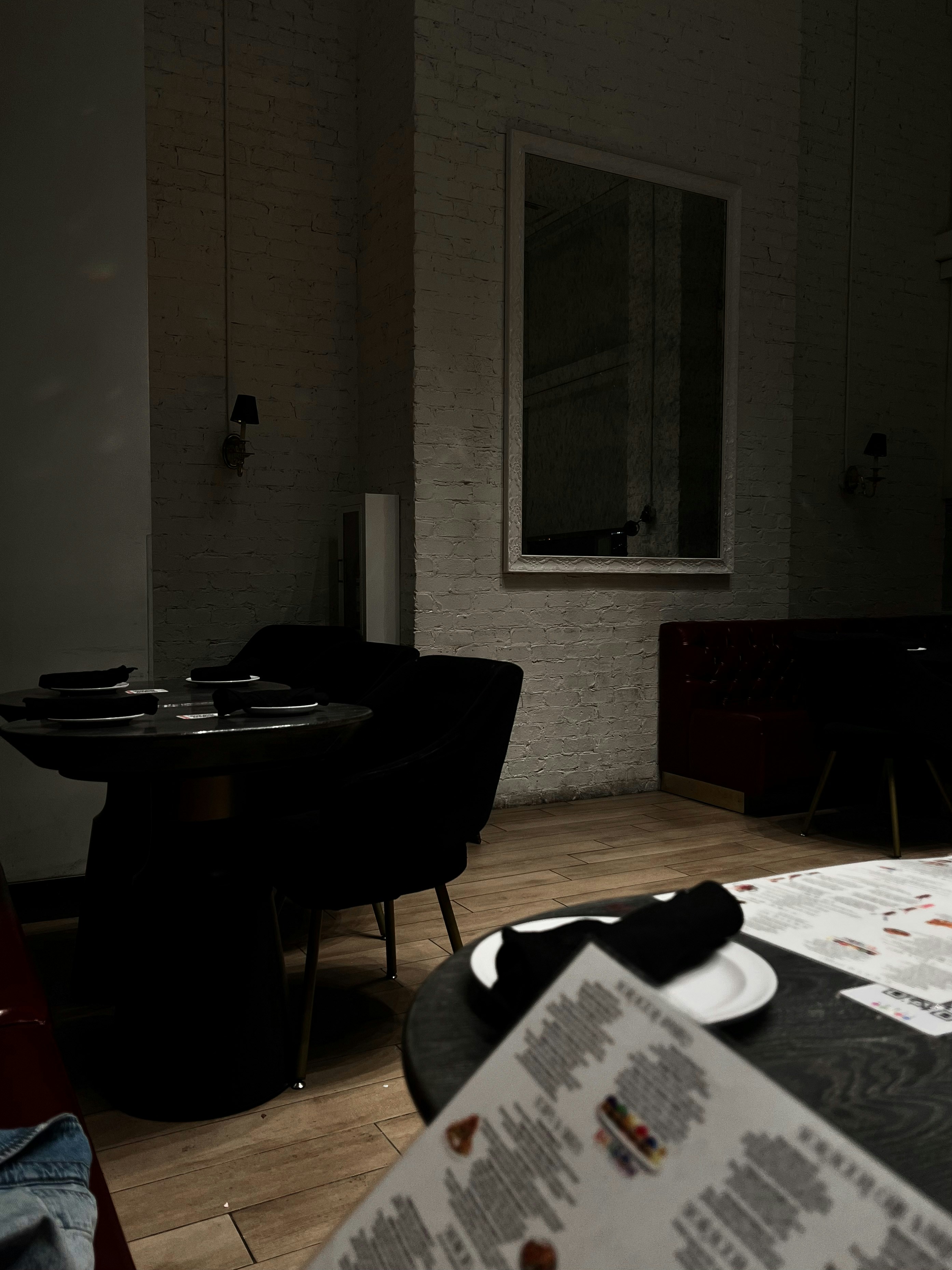 Screenshot of a sleek restaurant website with dark blue and white theme.