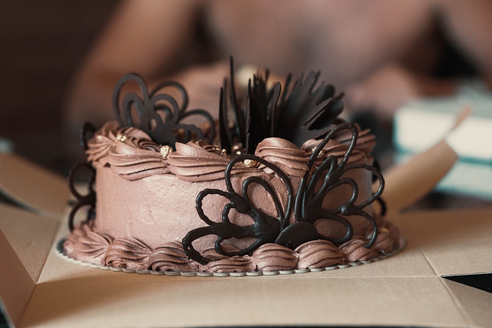 a chocolate cake with chocolate frosting