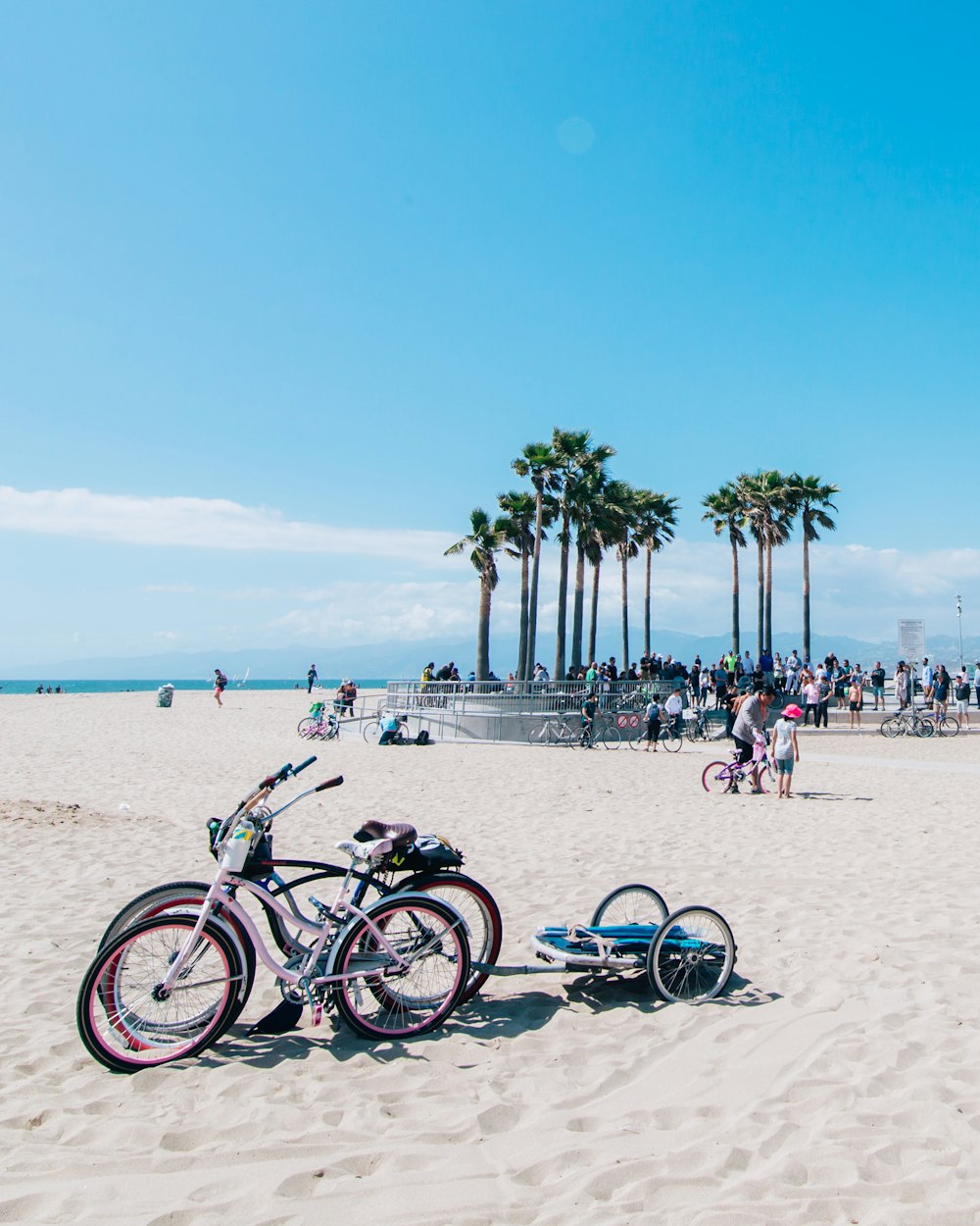 a group of people on a beach with Clearwater Beach in the background