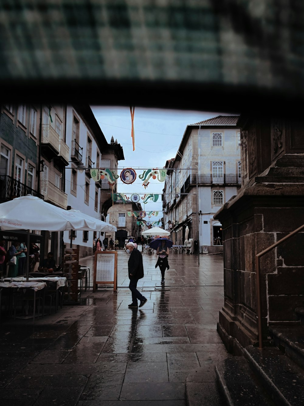 people walking down a street