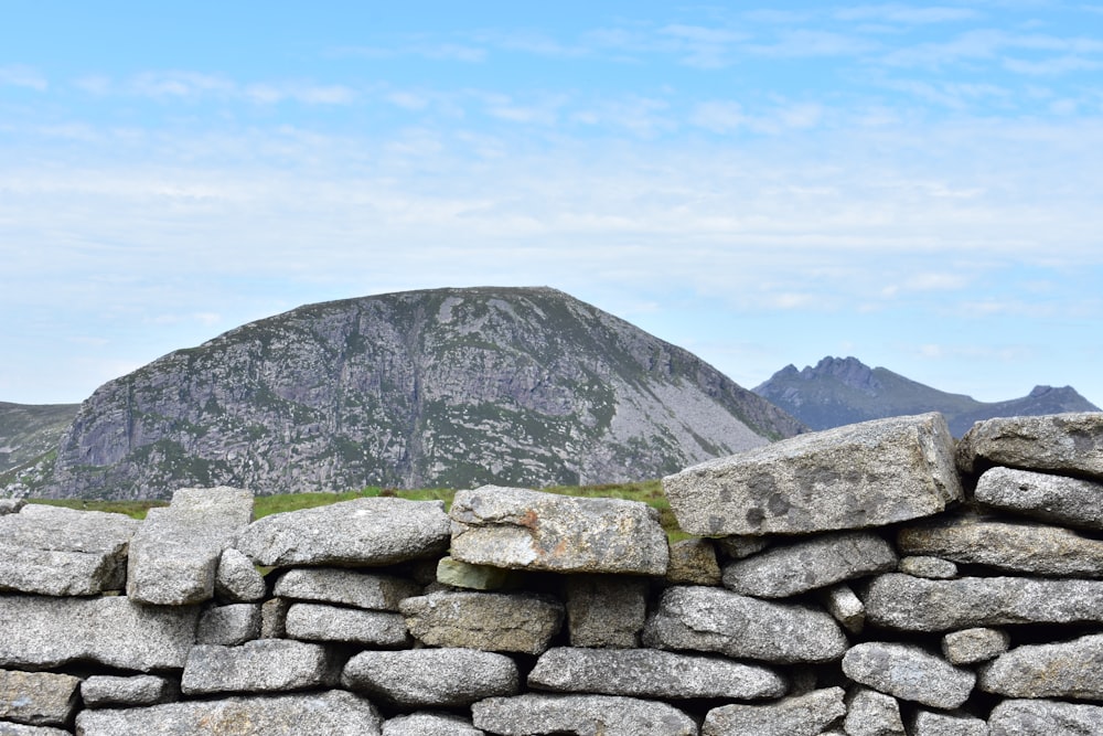 a large rock wall