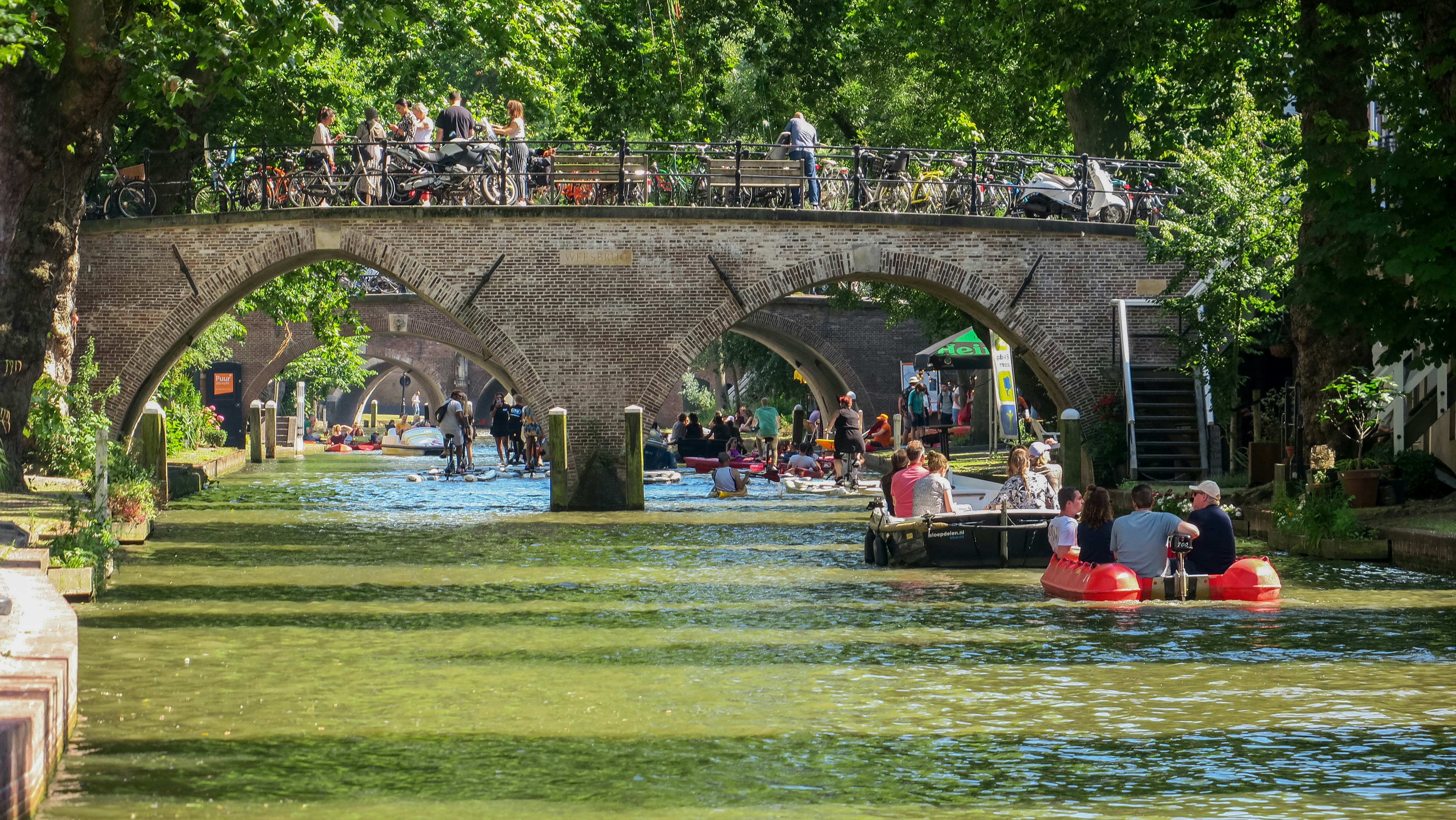 a group of people on a boat in a river