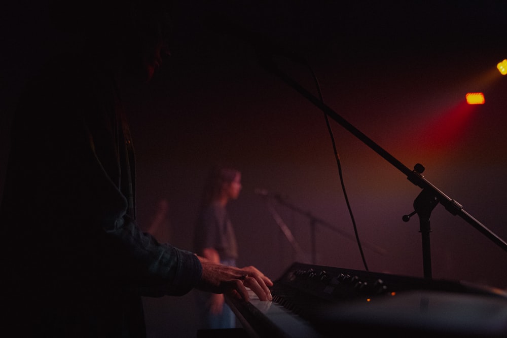 a man playing a keyboard