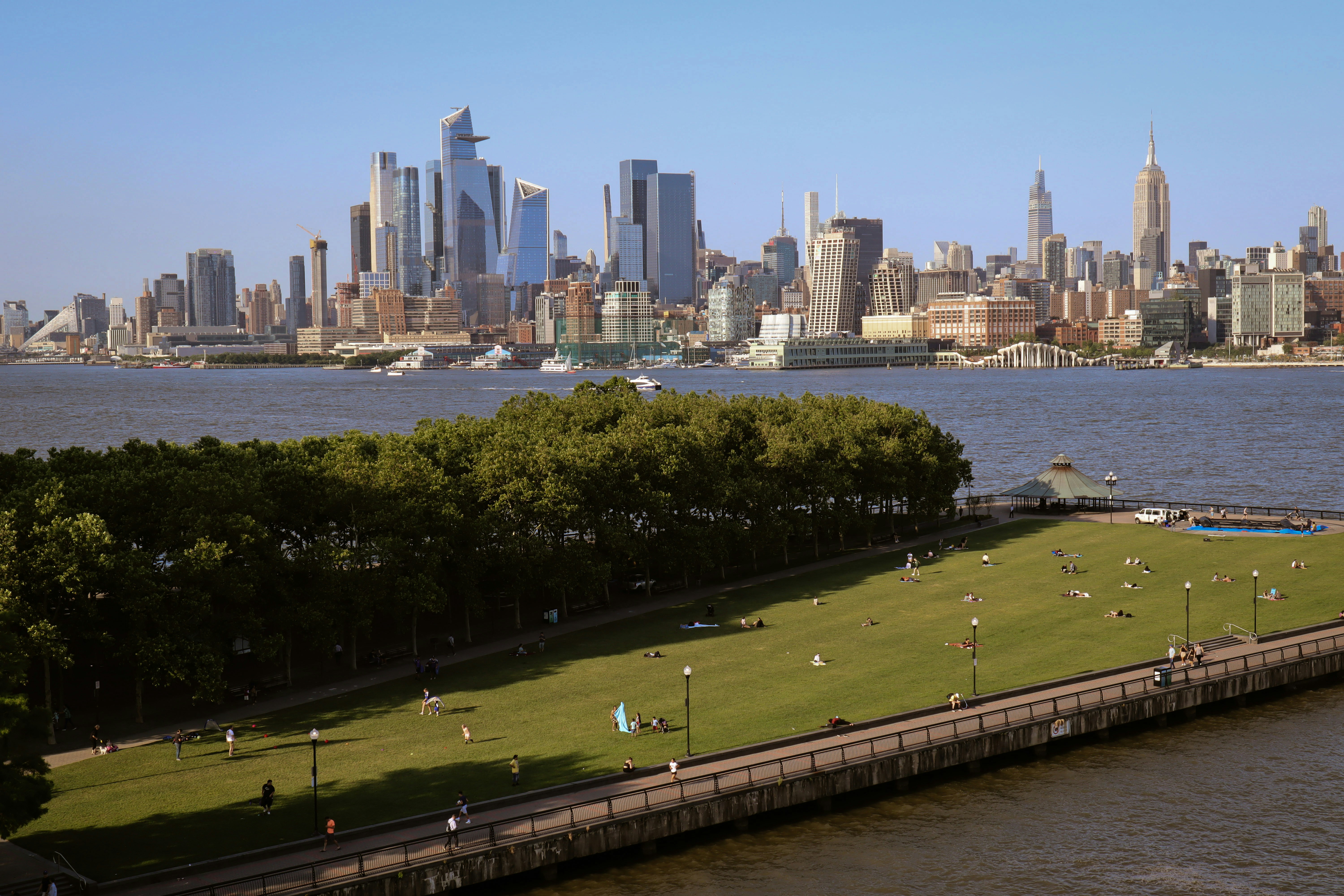 a park with a city in the background