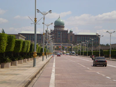a street with cars and buildings along it