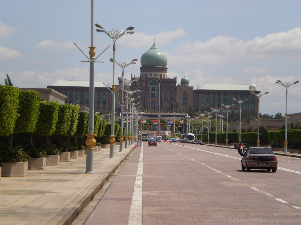 a street with cars and buildings along it