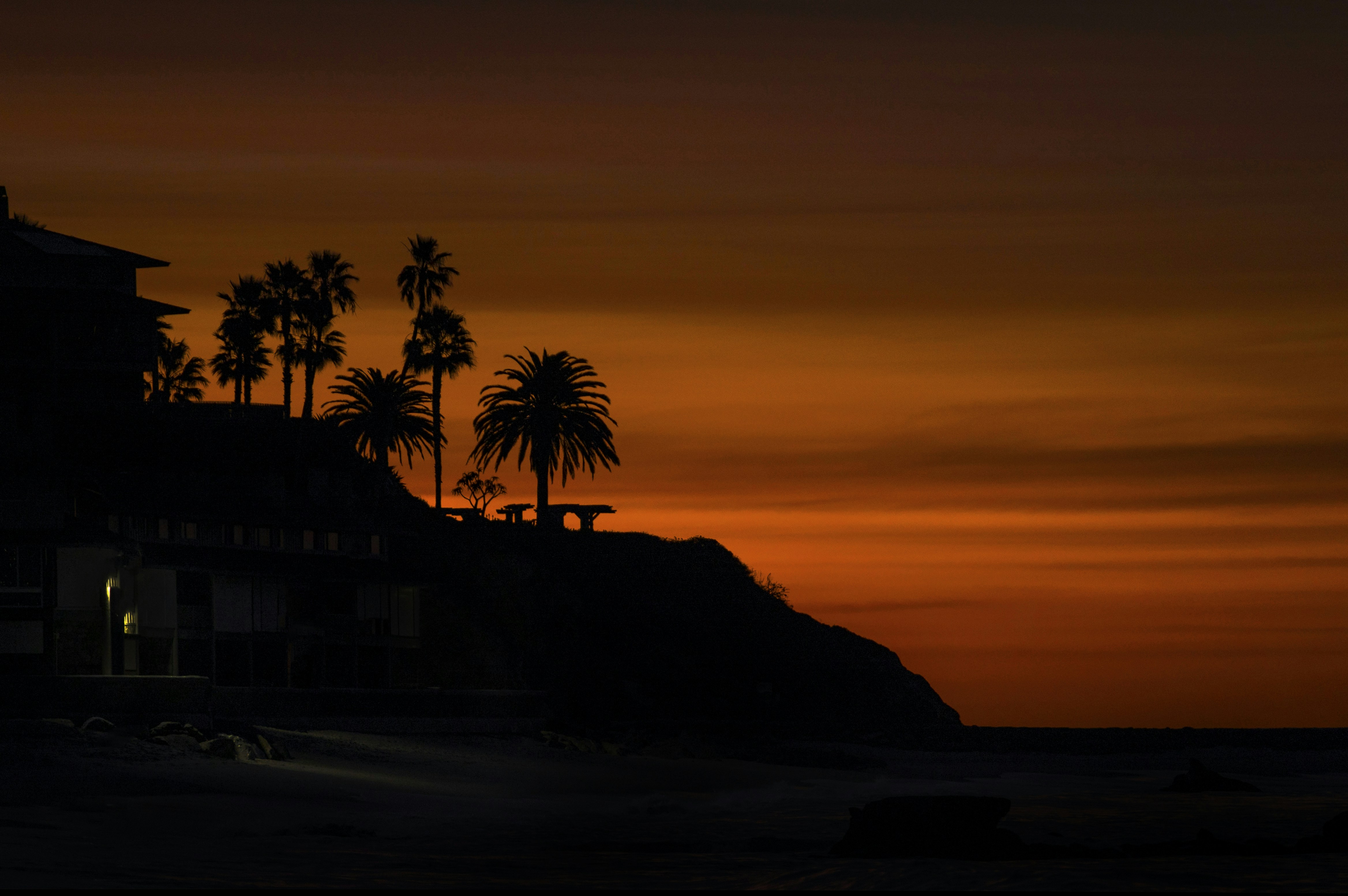 a sunset over a beach