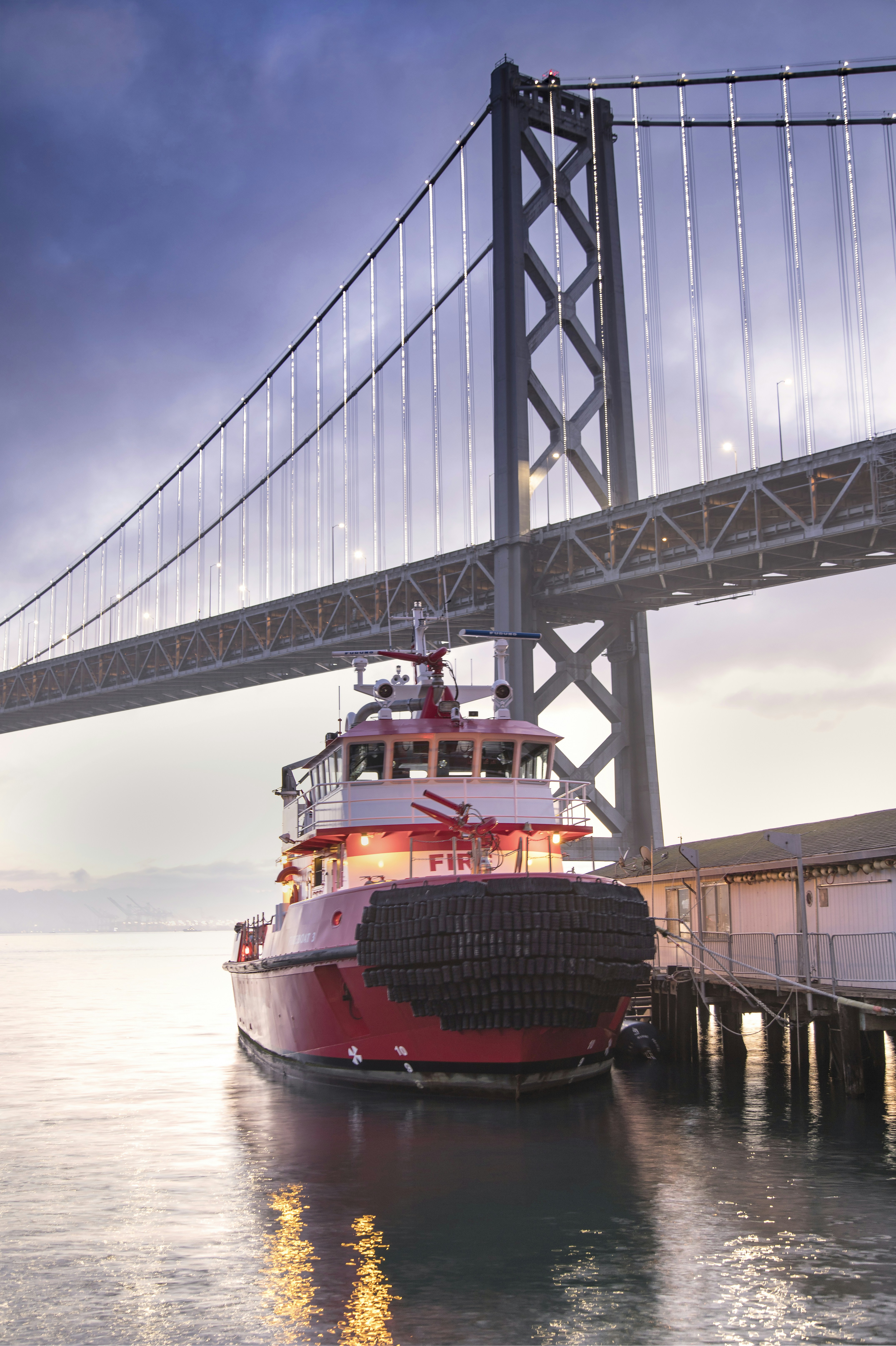 a boat under a bridge