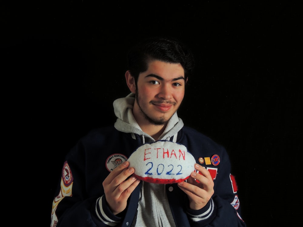 a man holding a card