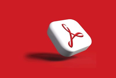 A bold red button on a clean white background, inviting user engagement.