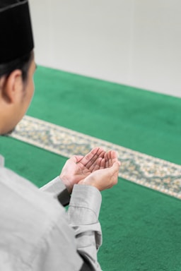 a person with the hands together