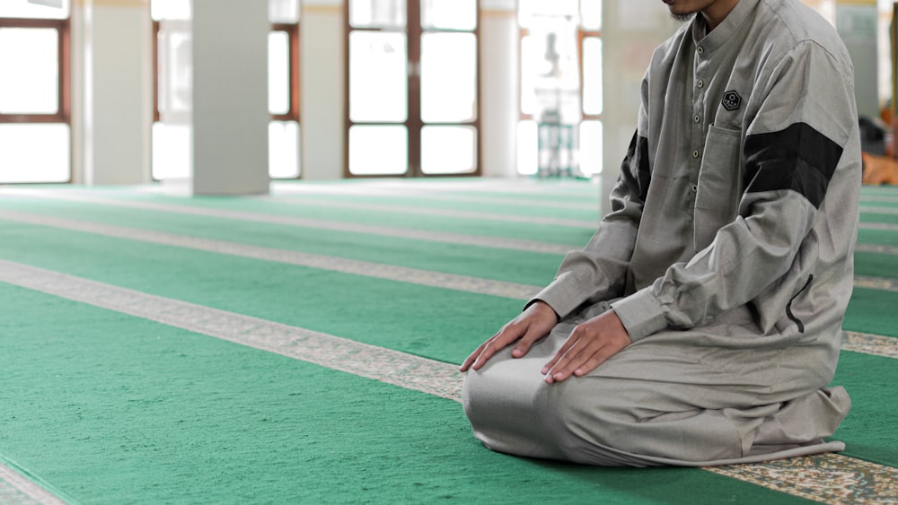 a man sitting on the floor