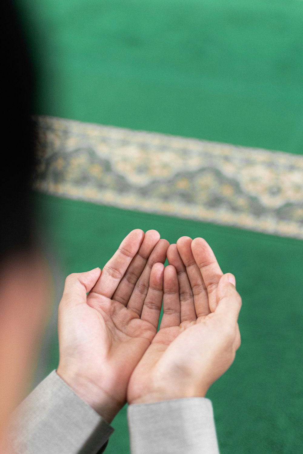 a close-up of hands holding each other